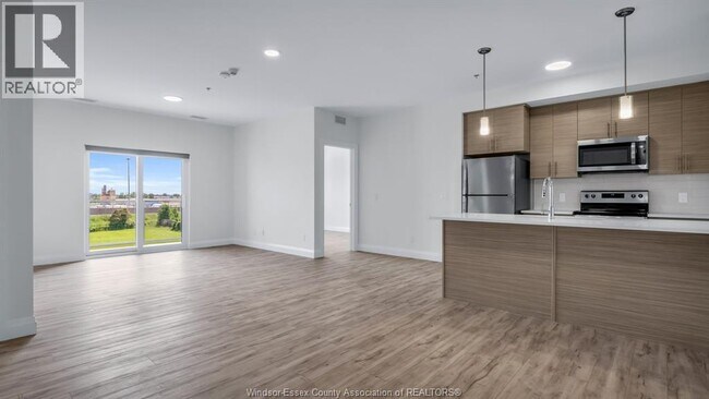 Photo - 4785 Walker Rd Unité 409