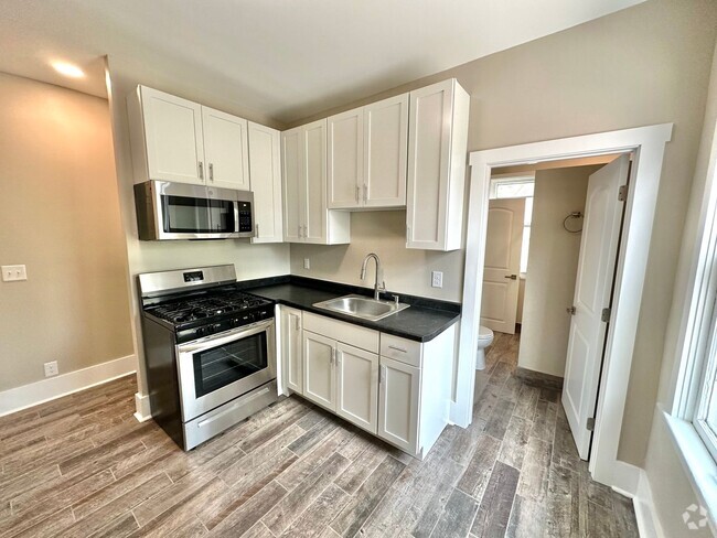 Building Photo - 1811 N Warren Ave Unit Lower Back Rental
