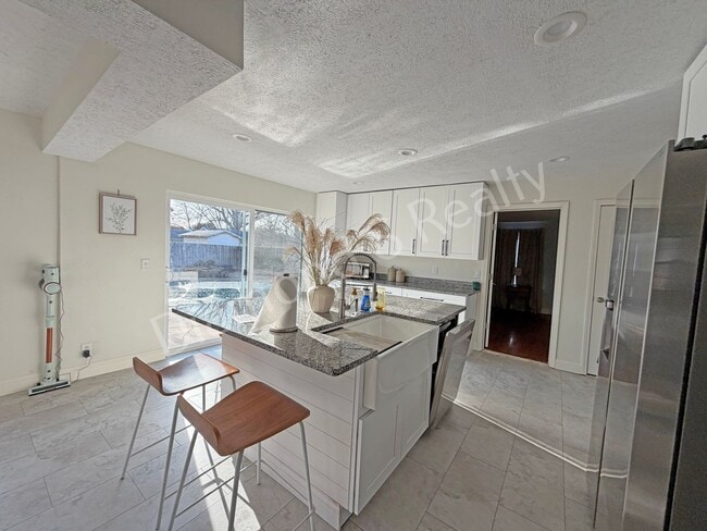 Photo - Stunning 3_Bed Home with Two Primary Suites & a Pool!