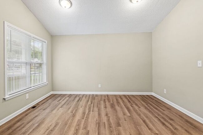 Photo - Welcome to this charming 4 bedroom, 2 bathroom home located in Greensboro, NC.