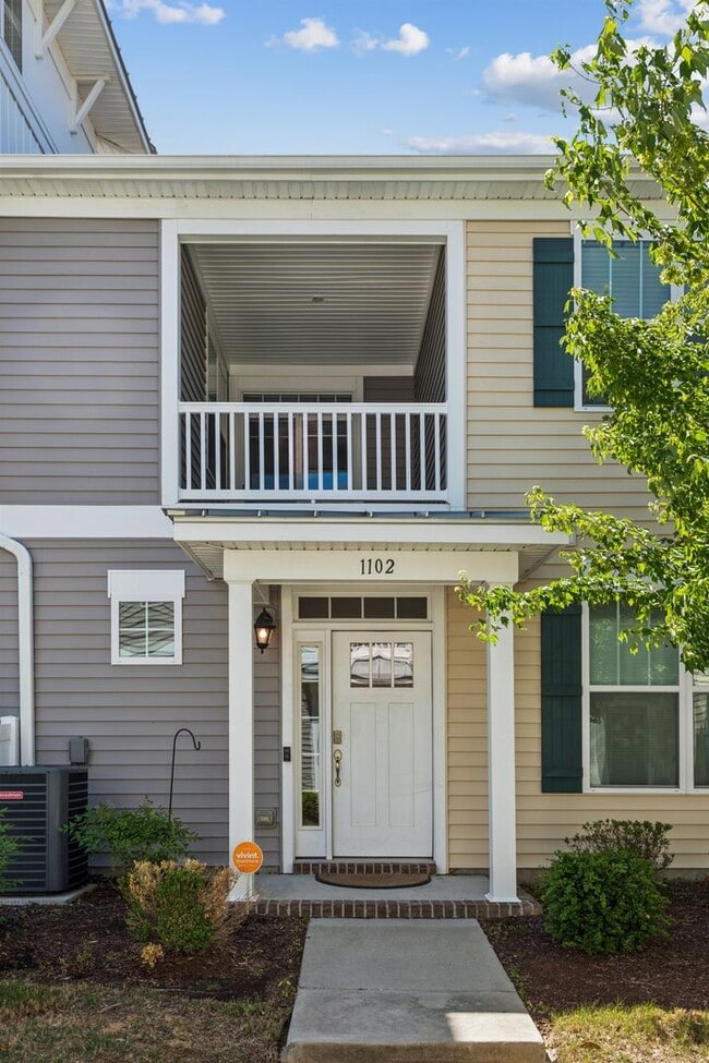 Photo - End Unit 2BR Condo with Garage, Balcony & Open Living