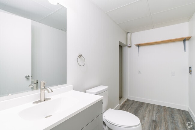 3BR, 2BA - 1,300SF - Bathroom - Westmont Apartments
