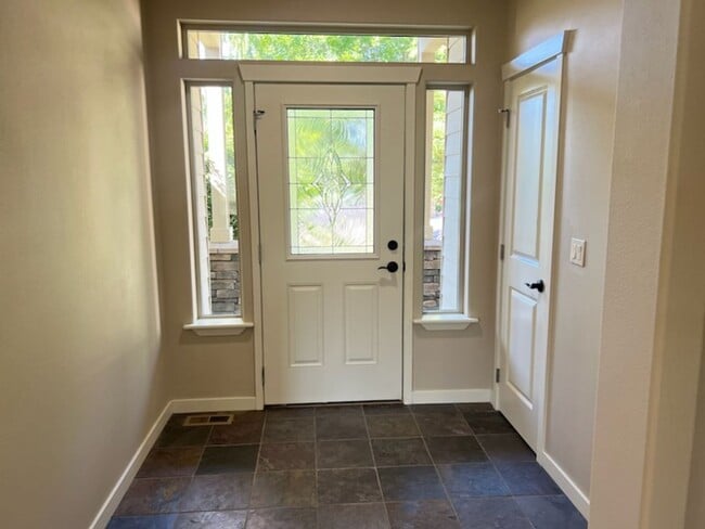 Photo - Beautiful 4 bed/2 bath home in excellent location, with a 3 car garage!