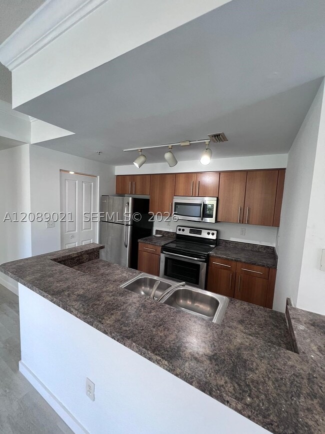 5980 W Sample Rd Unidad 301