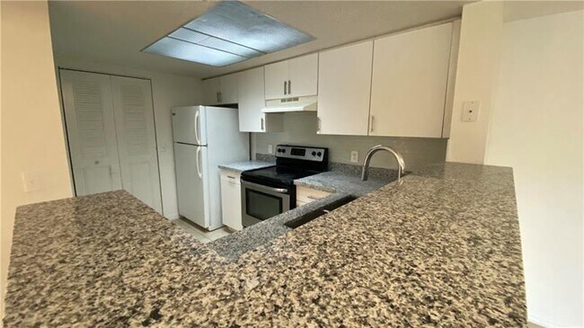 Photo - 5045 Wiles Rd Condo Unit 205