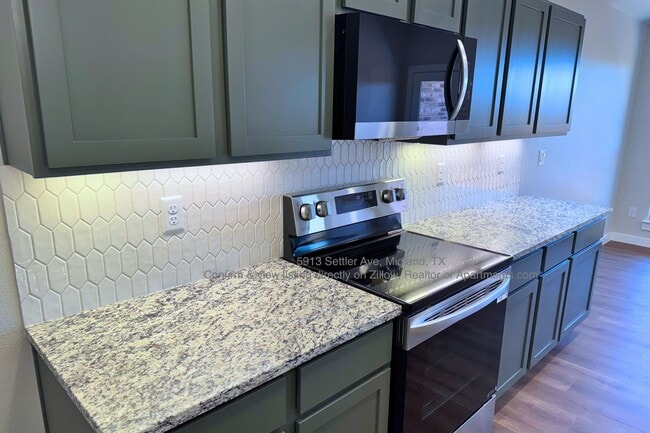 Kitchen with Under cabinet Lighting - 5913 Settler Ave