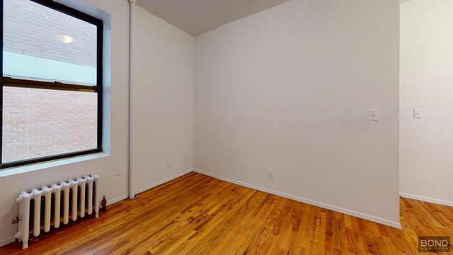 Building Photo - 415 E 73rd St Unit 4c Rental
