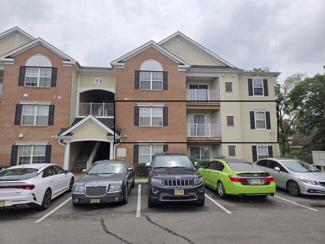 Building Photo - Gated community, 2nd fl condominium with 3...