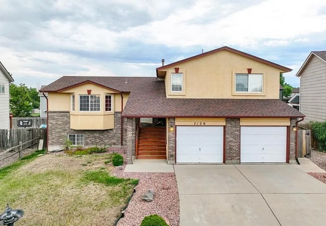 Building Photo - Spacious 5-Bedroom Home with Bonus Entertainment Room & Low-Maintenance Yard