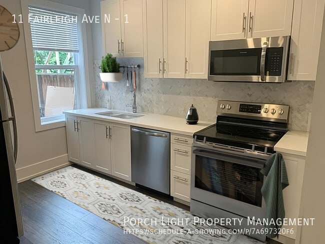 Building Photo - Main Floor 2 Bedroom with Parking, Yard and great deck Unit 1