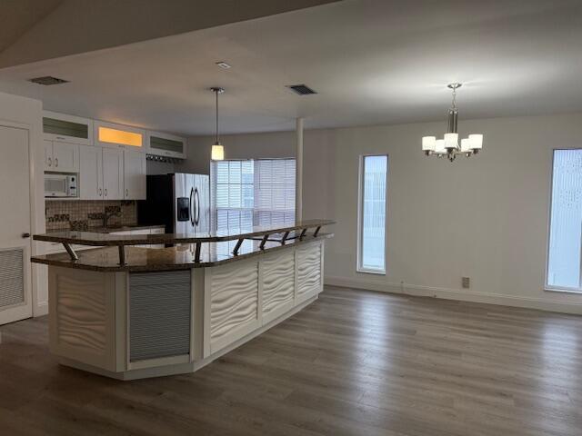Building Photo - 6237 Old Court Rd Unit 203 Rental