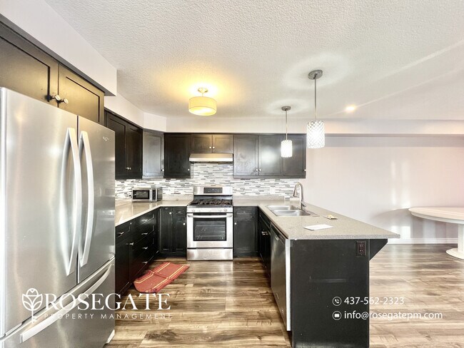 Photo - Spacious Main-Level Living with All Utilities Included in Woodstock Unit 1