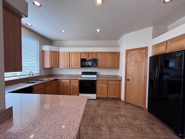 Photo - 4 Bed 3.5 Bath Home with Air Conditioning! - MileStone Real Estate Services - Available Now!