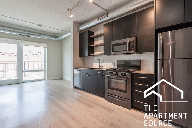 Building Photo - 931 W Belmont Ave Unit 604