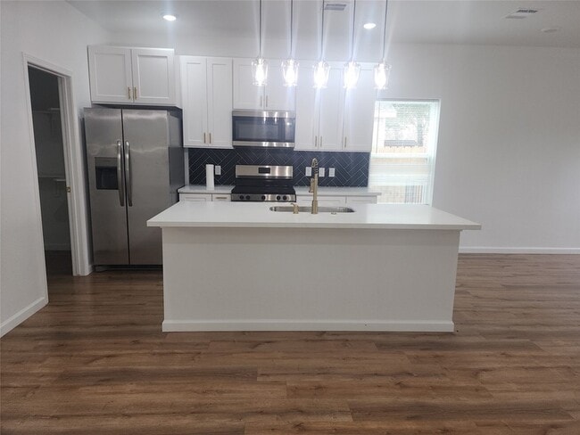 Building Photo - 6719 Roanoke St Unit A