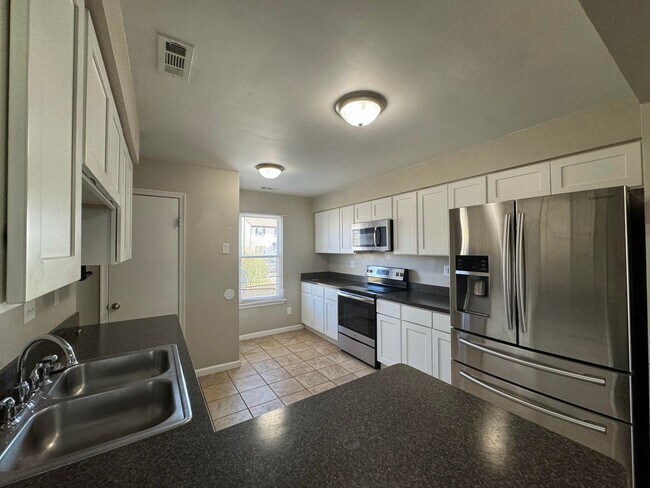 Photo - Introducing a stunning end unit town-home ...