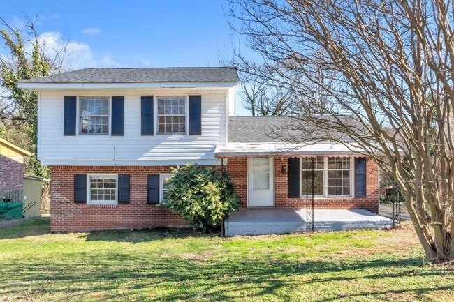 Building Photo - Spacious 4-Bedroom, 2-Bath Tri-Level Home with Multiple Living Levels $1675 /mo rent