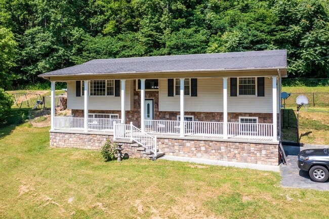 Photo - 3 br/ 2 bath home, private setting with garage/workshop