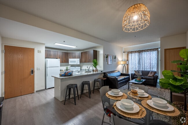 4BR, 4BA - 1,227SF - Living Room - The Quad on Delaware