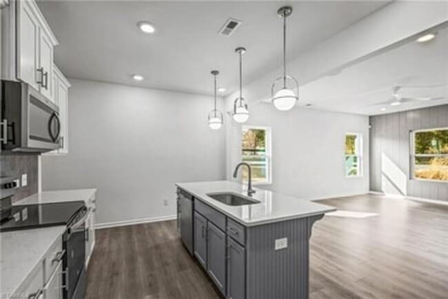 Photo - Spacious 3-Bedroom Townhome with Private Patio, Central HVAC & In-Unit Laundry Hookups
