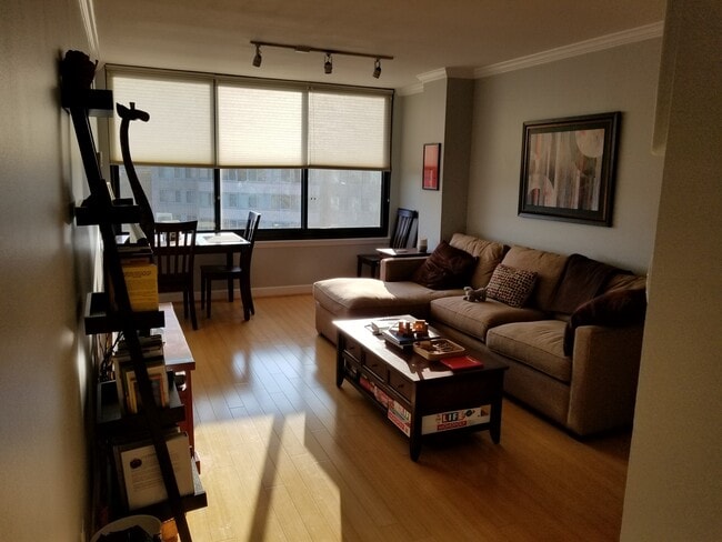 Spacious Living Room with West-Facing Views - 1301 20th St NW Unit 1010