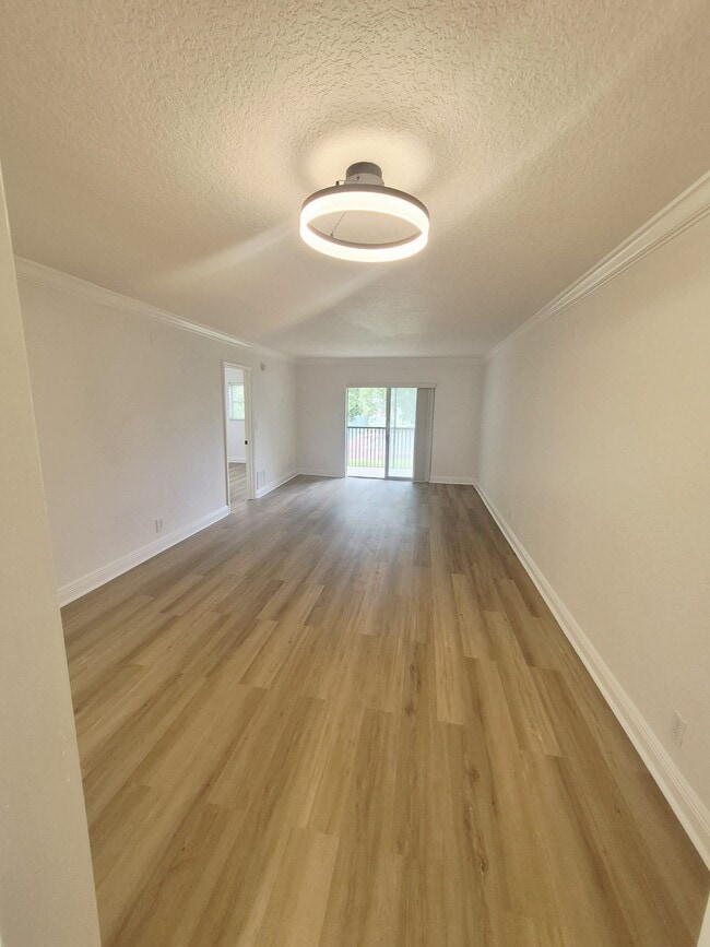 Building Photo - 5080 SW 64th Ave Unit 208