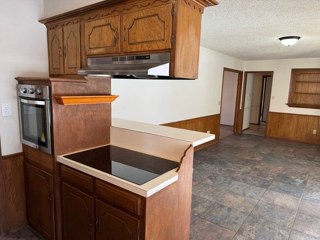 Photo - 3 bed, 2 bath, 2 car with 2 extra living spaces and new appliances, paint and carpet! Located clo...