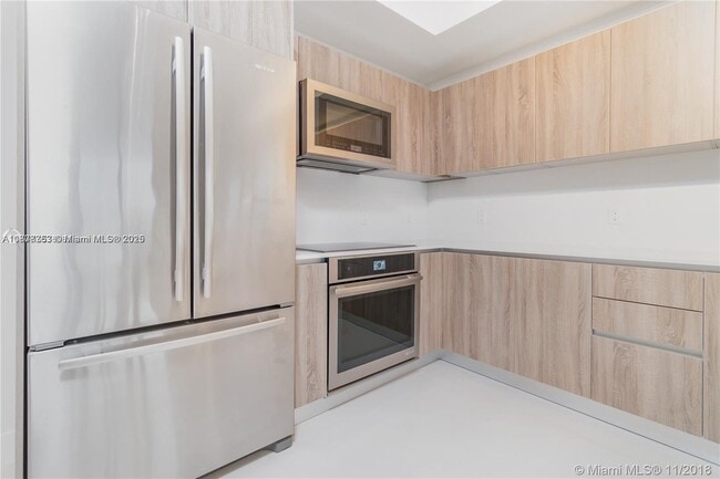 Photo - 2960 NE 207th St Unidad 901+Den