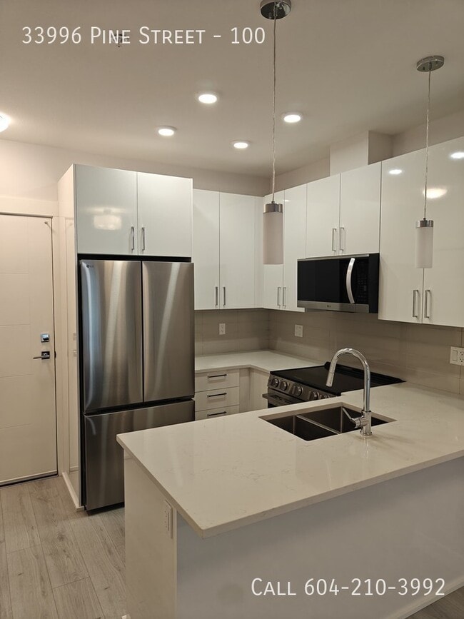 Building Photo - Brand New Condo With Two Parking Unit 100