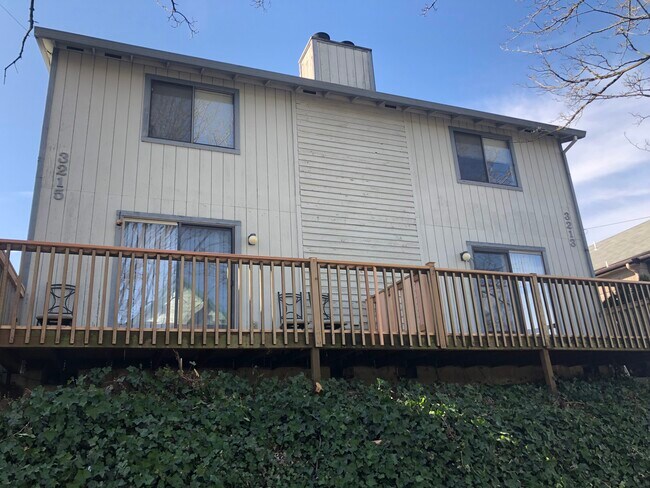 Wood railing has been upgraded to glass in other photos, and a 6ft privacy barrier installed. - 3215 S Corbett Ave Townhome