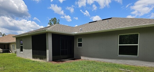 Photo - *****BEAUTIFUL 4/2 HOME IN PALM COAST SCREENED IN LANI