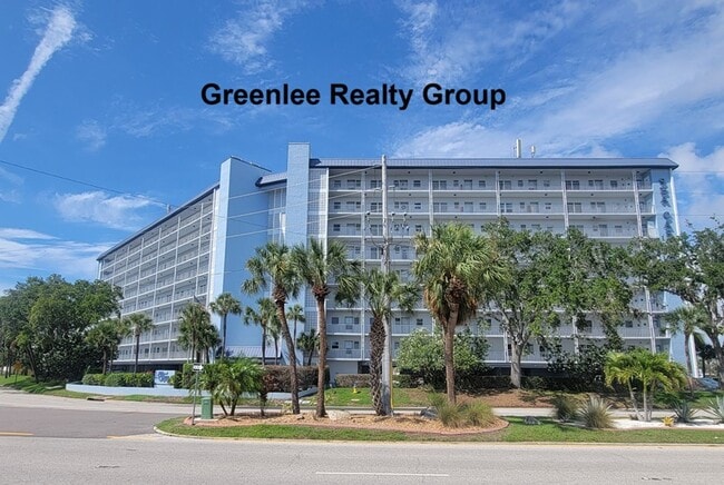 Building Photo - Waterfront Living & Maintenance Free Living at Its Finest – With Views You’ll Never Get Tired Of!