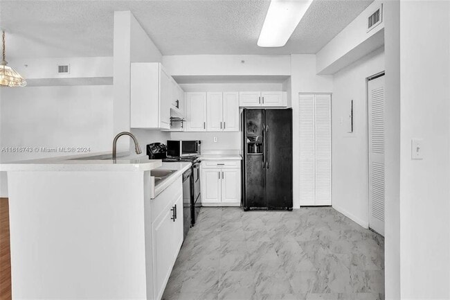 Building Photo - 6928 SW 39th St Unit A102 Rental