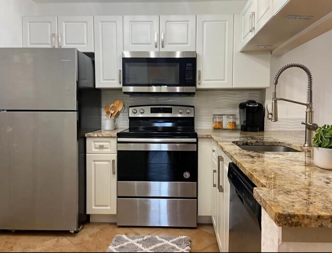 Building Photo - 2812 Grande Pkwy Unit 202