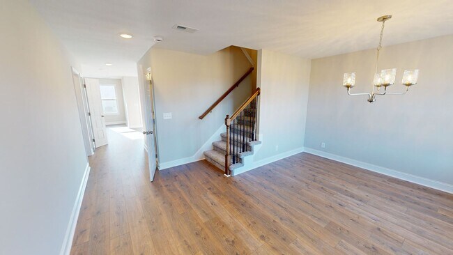 Photo - Modern Home with Open Layout, Fireplace and Farmland Views