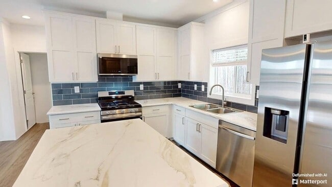 Photo - Clean new home in great location. close to downtown, parks, restaurants, shopping