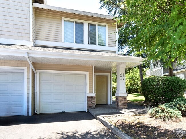 Building Photo - Spacious and Elegant Townhouse-style 2 Bed... Unit 204