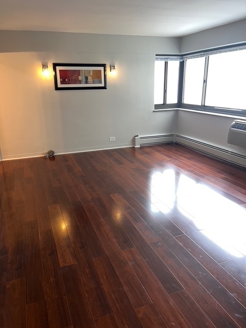 Living room lake view - 7337 S South Shore Dr Unit 607