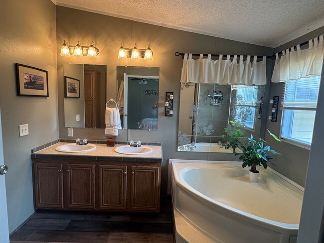 Photo - Spacious 3-Bedroom Home with Fenced Lot an...
