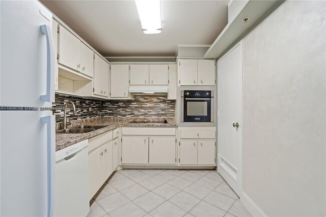 Photo - 400 Kings Point Dr Unidad 1502