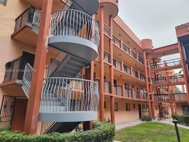 Building Photo - 5350 W 21st Ct Unit 203