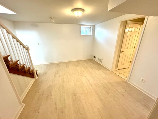 Living Room or Bedroom (new light wood design tiles) - 201 E Indian Spring Dr Unit 1 - Yard - Utilities