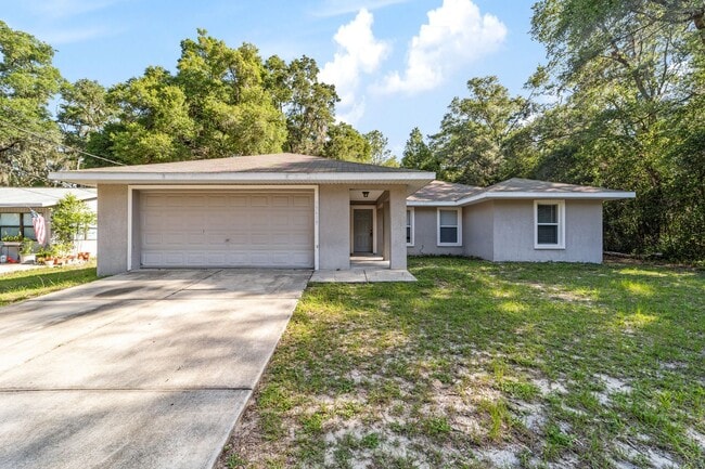 Photo - Peaceful 3-Bedroom Home with Open Floor Plan & Two-Car Garage in Rainbow Lakes Estates!