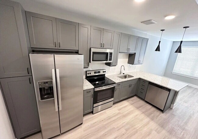 Building Photo - 5005 E Parmer Ln Unit 10101