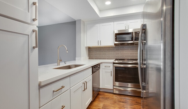 Kitchen complete with breakfast bar and pantry