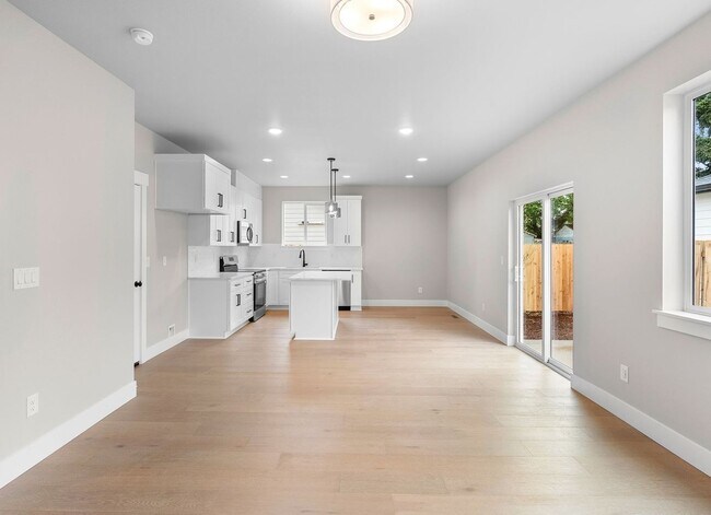 Photo - Brand-New 4-Bedroom Home Offering Modern Design, High-End Finishes, Attached Garage & Private Bac... Unit #A