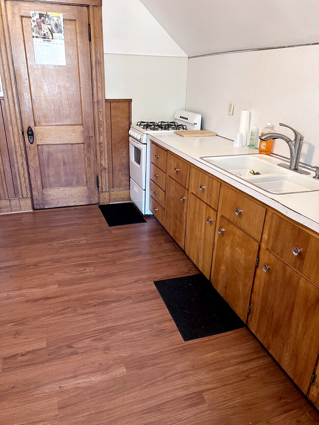 Kitchen - sink, counter, stover, pantry closet - 96 Lawrence St Unit #3