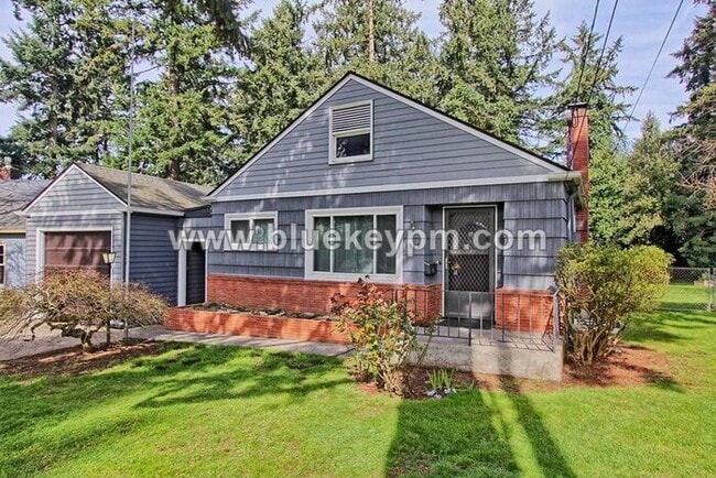 Photo - 4 Bedroom, 2 Bath Home with Primary on Main Floor, Basement and Large Fenced Yard