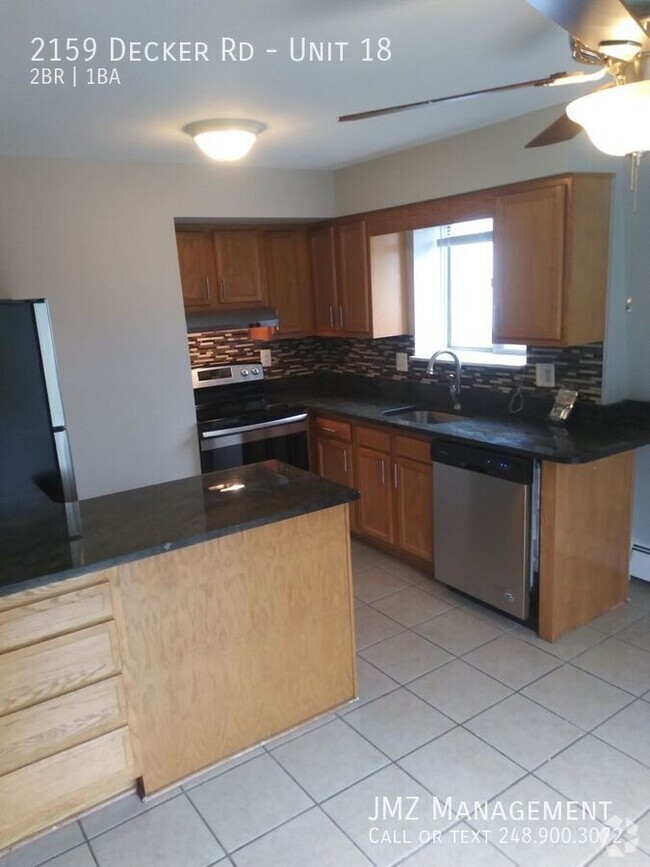 Building Photo - Beautifully Updated Apartment In Walled Lake! Unit 18