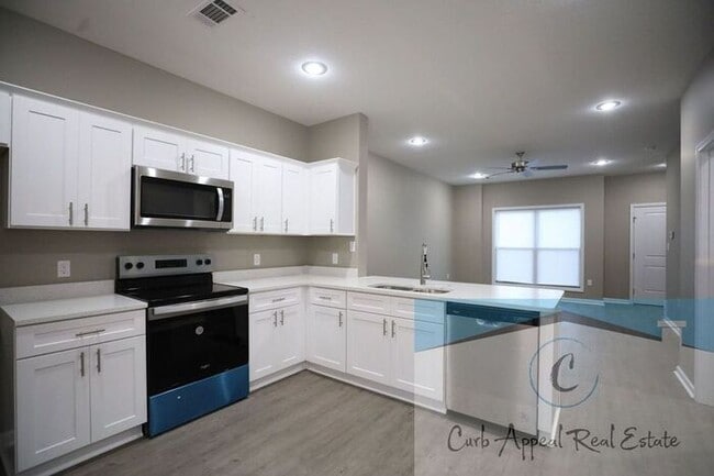 Photo - First month move in special $950!! Luxury 2 bed 2 bath apartment - brand new construction!! Washe...